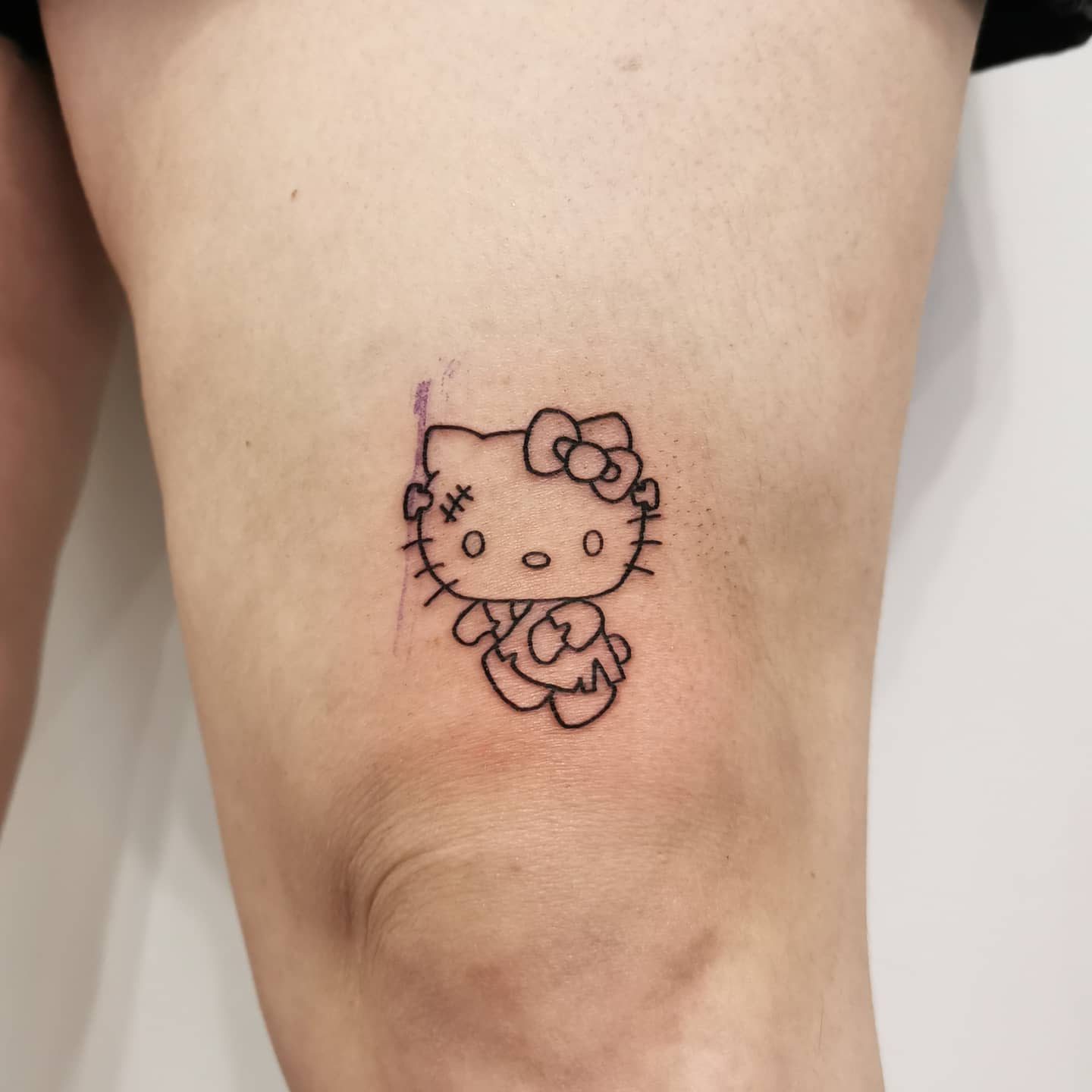 Hello kitty tattoo ideas featuring cute and playful imagery